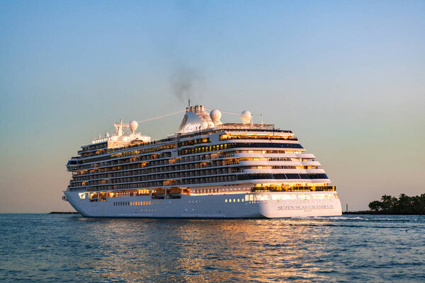 Miami, Florida, USA - December 07, 2024: Cruise ship tour. Travelling at sea. Ship leaving harbor. Seven seas Grandeur cruise ship voyage. Cruise in summer vacation. Regent seven seas cruises.