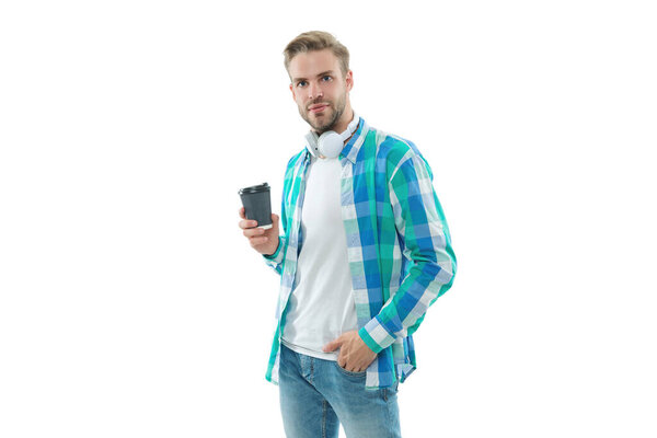 Drinking espresso and wearing headphones. Man drinking tea. Warm morning. Coffee break at home. Millennial man having coffee cup isolated on white. Morning coffee time. Lifestyle concept.