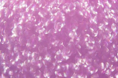 Odaklanamayan ışıltı. Bokeh sahne arkası ışıltısı. Bokeh etkisi. Parıltı parlıyor. Bokeh 'in pırıl pırıl arka planı. Bulanık odaklı arka plan. Pırıl pırıl bir fon. Parıldayan arka plan. Parıltı parlıyor.