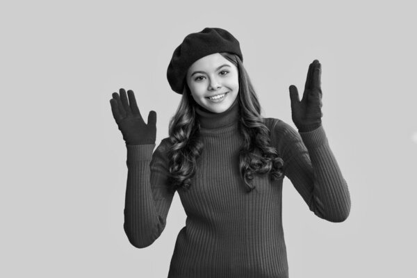 Autumn fashion girl. Trendy and stylish teenager girl smiling. Fall fashion style for teen. Outfit for fall style. Girl in autumn beret. Teen girl isolated in yellow. Autumn accessories.