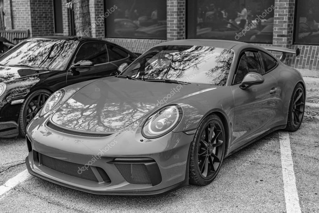 Chicago, Illinois - September 29, 2024: 2018 Porsche 911 GT3. Red 2018 Porsche 911 GT3 parked on the street