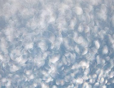 Odaklanamayan ışıltı. Bokeh sahne arkası ışıltısı. Bokeh etkisi. Parıltı parlıyor. Bokeh 'in pırıl pırıl arka planı. Bulanık odaklı arka plan. Pırıl pırıl bir fon. Parıldayan arka plan. Parıltı parlıyor.