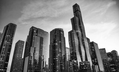 Şehirdeki gökdelen. Şehir merkezinde gökdelenli. Ofis inşaatı bölgesi. Modern bina. Chicago şehri. Yüksek perspektif. Gökdelen mimarisi. Camdan iş gökdeleniName.