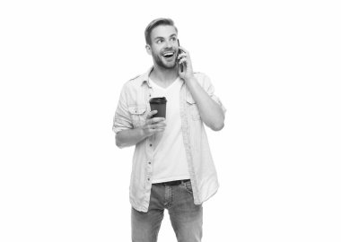 Sabah vakti kahve molası. Meşgul bir adam telefonda konuşuyor. Beyazlar içinde..