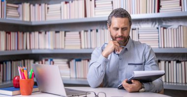 Teachers from university exam. man school teacher at the school lesson. knowledge of educated man. College teacher. Teacher in classroom. man teacher study at workplace. Differentiated instruction.