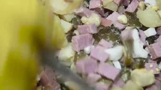 Spoon Stirs Salad Sausage Potatoes Pickled Cucumbers Close — Stockvideo