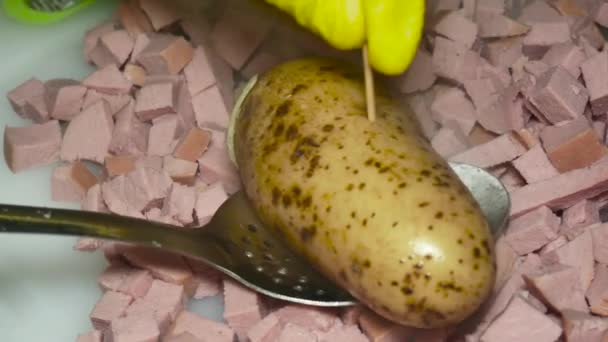 Cook Hand Checks Toothpick Boiled Potato Peel Boiled Sliced Sausage — Stock video