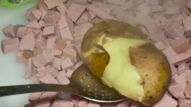 Cook Hand Checks Toothpick Boiled Potato Peel Boiled Sliced Sausage — Stockvideo