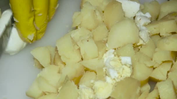 Cook Hand Cuts Boiled Egg Next Boiled Potatoes Close — Stok video
