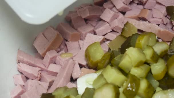 Adding Sliced Pickled Cucumber Boiled Eggs Pot Sliced Boiled Sausage — Vídeo de stock