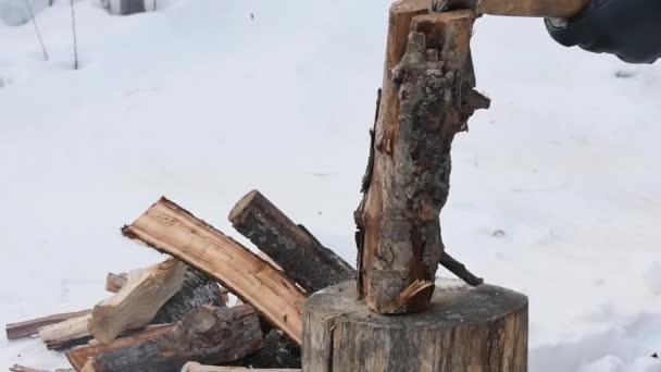 Hand Trying Cut Log Snowy Yard Slow Motion Close — Stockvideo