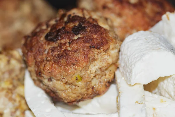 stock image  homemade cutlets and white cheese in a plate, close-up