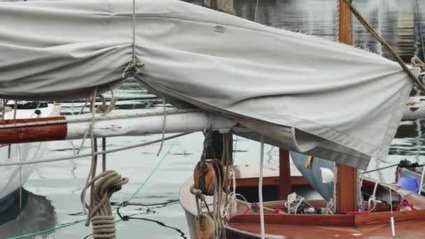 Iron Mast Furled Sail Next Moored Sailboats City Harbor — Stock Video