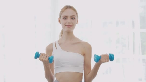 Beautiful Young Woman Workout Lift Dumbbell Muscle While Motivation Determined — Video