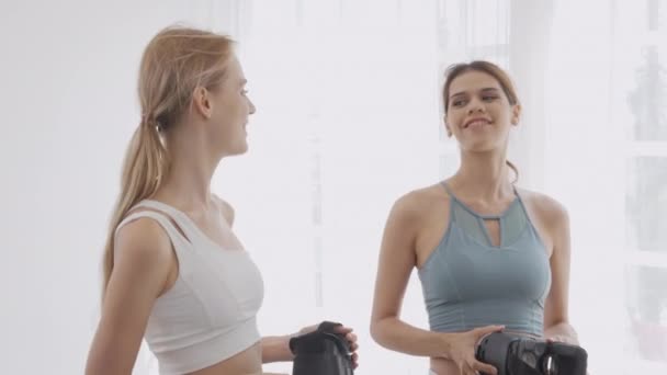 Two Young Woman Wearing Glasses Workout Exercise Talking Together Living — Vídeo de Stock