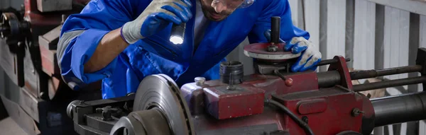 Young Man Sanding Iron Industrial Factory Mechanic Working Job While — Zdjęcie stockowe