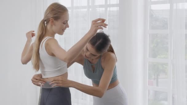 Two People Young Woman Measuring Waist Weightloss Together Living Room — Wideo stockowe