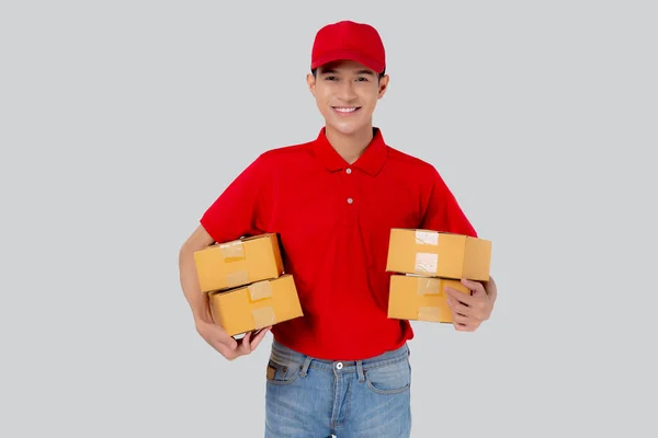Young Asian Man Uniform Red Cap Standing Carrying Box Stack - Stock-foto