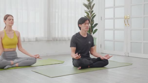 Young Asian Man Woman Practicing Yoga Meditating Relaxation Balance Life — Vídeos de Stock