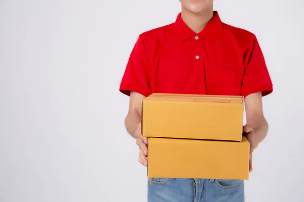 Young Asian Man Uniform Red Cap Standing Carrying Box Stack — 스톡 사진