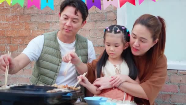 Happy Asian Family Father Mother Daughter Eating Food Restaurant While — Stock Video
