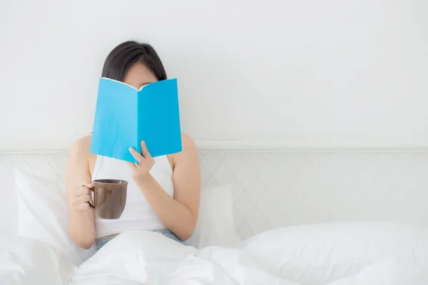 Young Asian Woman Reading Book Holding Coffee Glass Relax Cozy —  Fotos de Stock