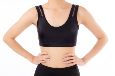 Beyaz arka planda ince izole edilmiş, güzel Asyalı bir kadının beline ve karnına yakın egzersiz ve zayıflık için diyet, sağlık ve refah kavramı ile egzersiz..