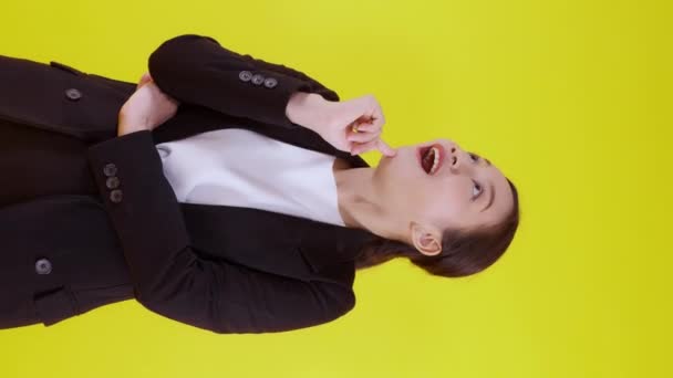 Portrait Young Asian Business Woman Presenting Thumbs Isolated Yellow Background — Stock Video