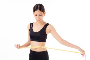 Güzel, genç Asyalı kadın kilo vermek için beliyle ölçü bandı, izole edilmiş beyaz arka plan, spor kıyafetleri içinde zayıf vücut, spor, spor ve sağlık konsepti olan kadın..