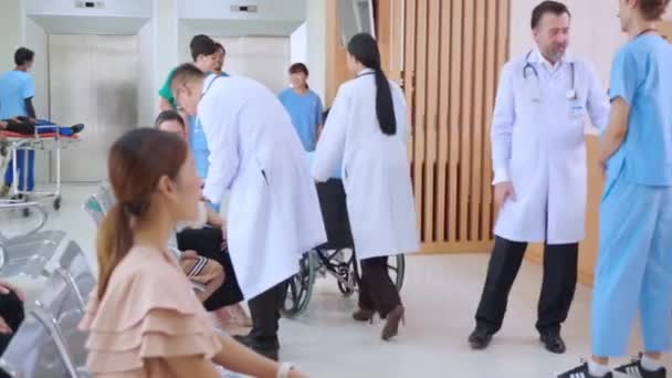 Doctors Nurse Patient Walking Corridor Hospital Reception Hallway Ethnicity Diversity — Stock Video