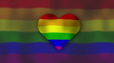 Kalp şeklinde gökkuşağı bayrağı, LGBT LGBTQ gurur bayrağı rüzgarda sallanan gay gurur bayrağı. Farklı renklerde LGBT sembolü. Atan bir kalple gökkuşağı arka planı.