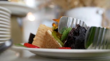 Delicious gourmet dessert with caramel, chocolate and fruit. Delicious and professional fruit birthday cake. Rich restaurant or hotel cake from the chef. Fruit cake.