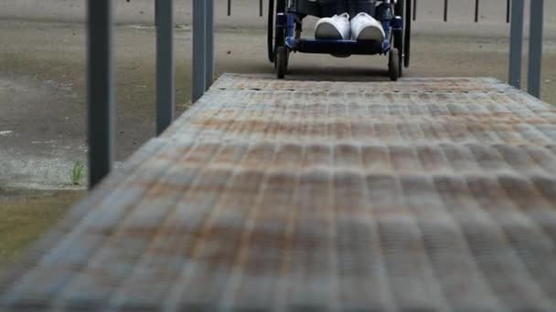 Disabled Young Man Wheelchair Drives Ramp Close Wheelchair Wheel Disabled — Stockvideo
