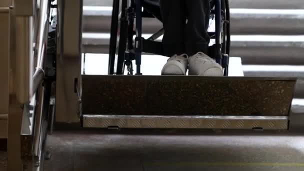 Disabled Young Man Wheelchair Ascends Automatic Electric Ramp Close Wheelchair — 图库视频影像