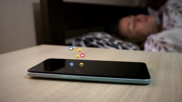 Positive Emoji Appears Mobile Smartphone Which Lies Bedside Table Animated — Stock Video