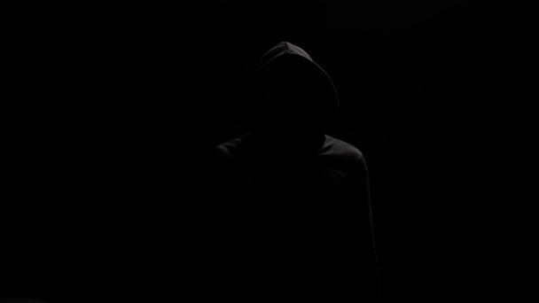 Isolated Portrait Mysterious Figure Black Hoodie Pointing Camera Finger Figure — Stock Video