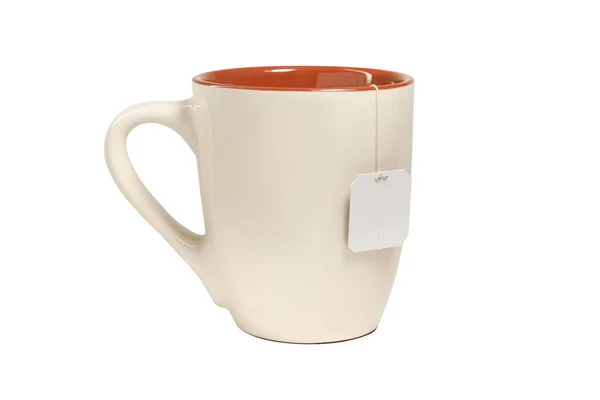 Caneca Cerâmica Bege Com Etiqueta Teabag Isolado Fundo Branco — Fotografia de Stock