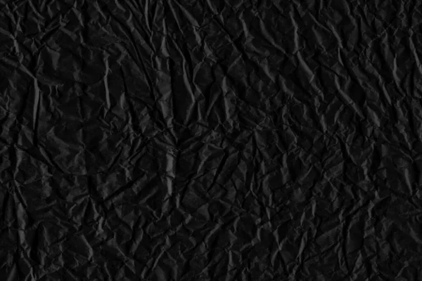 stock image dark wrinkled paper. abstract wrapping paper a high resolution texture