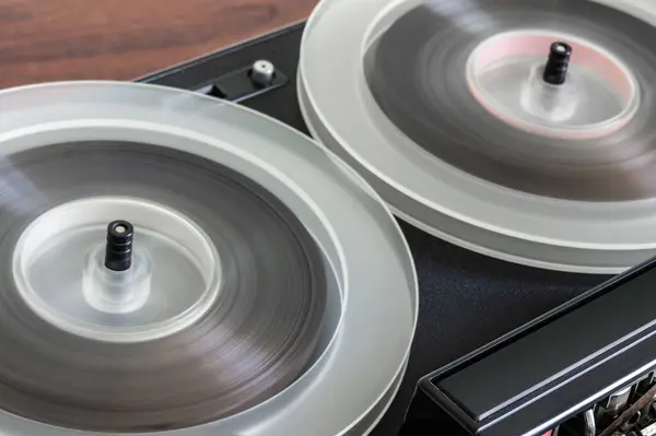 Vintage Magnetic Tape Reel Rewinding on Reel-to-Reel Deck