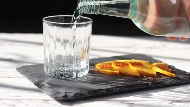 Man Pouring Clear Liquor Tequila Vodka Mezcal Fancy Glass Next — Stok video