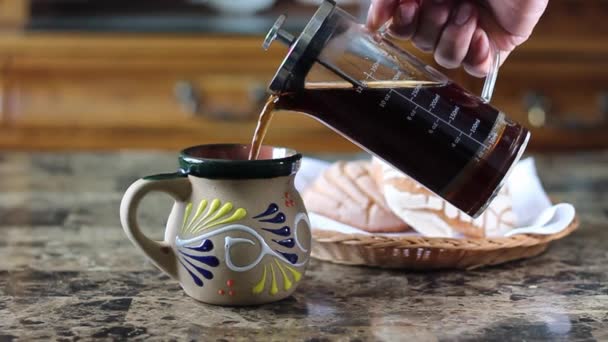 Man Pouring Coffee French Press Traditional Mexican Cup Front Bread — Stockvideo