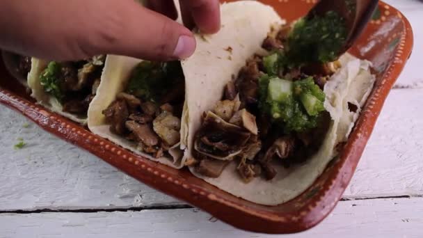 Close Man Putting Green Sauce Lemon Carnitas Pueco Taco Mexican — Stock Video