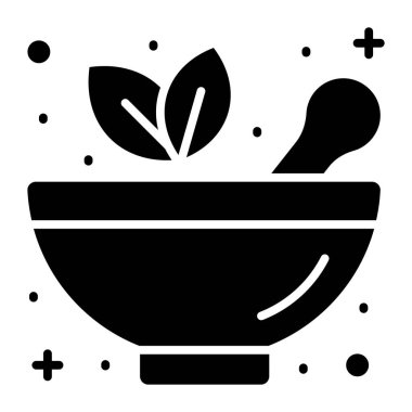 Bitkisel ilaçları simgeleyen bitkisel yapraklarla havan topu tokmağı.