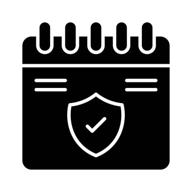 Sigorta geçerliliği ve sigorta takviminin konsept simgesini gösteren takvimdeki kalkan