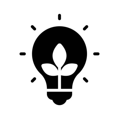 Ampulün içinde, ekolojik ışık konsepti tasarımı simgesini gösteren yapraklar