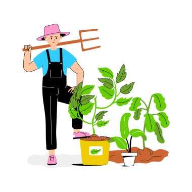 Bir bahçıvan özenle ve özenle bitkilerle ilgileniyor.