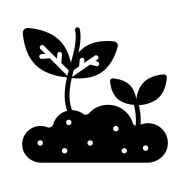 Topraktan çıkan genç bir filiz, yeni büyümeyi simgeliyor.