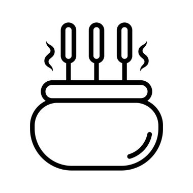 Sakinleştirici kokular yaymak için zarif bir tütsü yakıcı.