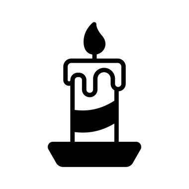 Yanan mum simgesi ışığı, barışı ve kutlamayı simgeliyor..