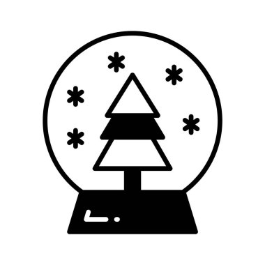 İçinde Noel ağacı olan kar küresi, klasik bir bayram süsü.